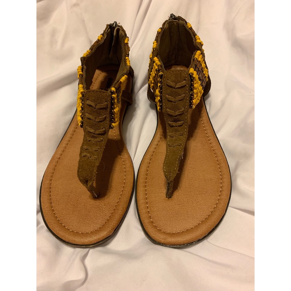 Never worn Minnetonka sandals!